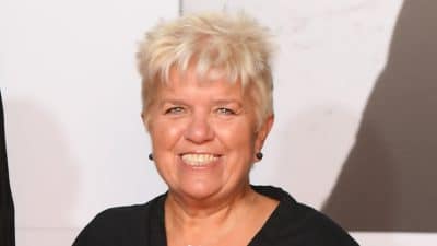 Mimie Mathy souriante