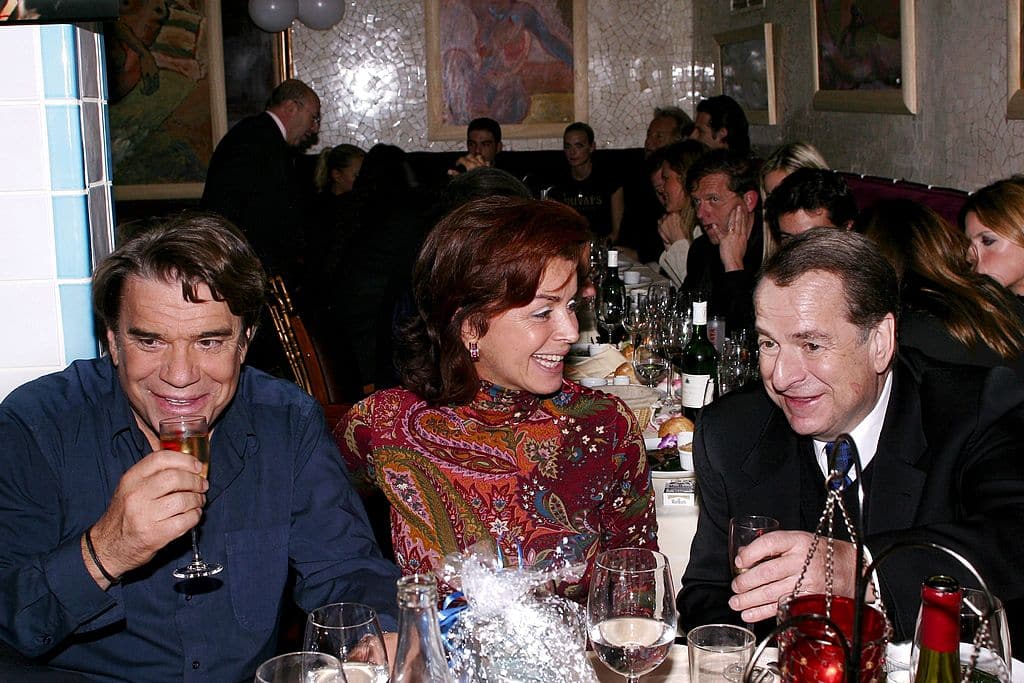 Bernard et Dominique Tapie, lors d'un dîner avec Paul-Loup Sulitzer en 2004.